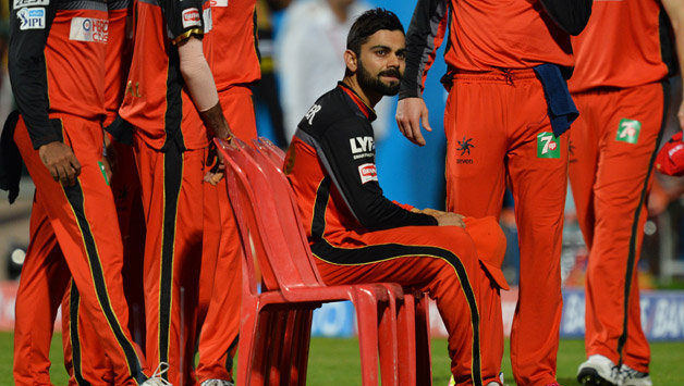 Virat Kohli (above) admitted his and South African AB de Villiers' dismissals in quick succession did not help RCB's cause as they fell short by eight runs © AFP