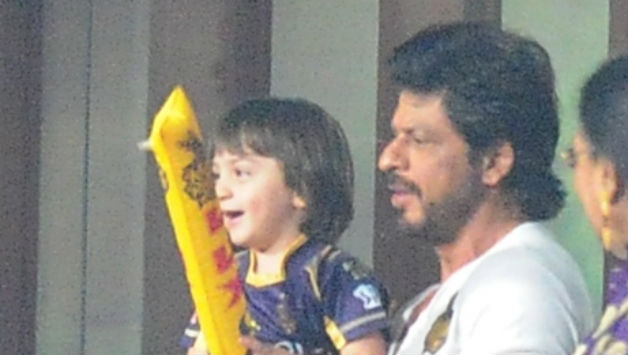 SRK with his son at the stadium © IANS