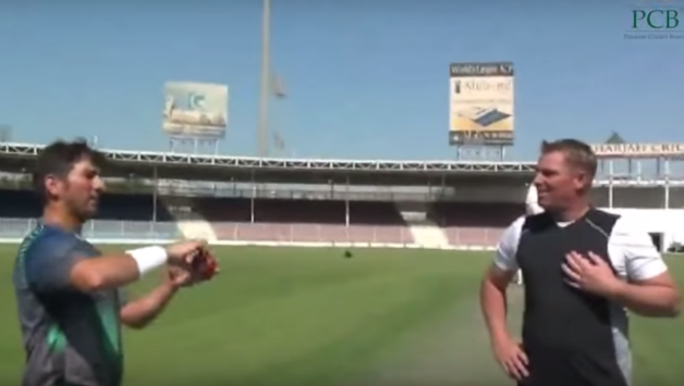 Yasir Shah learning about flipper delivery from Shane Warne. Photo Courtesy: Pakistan Cricket Youtube (Photo grab from video)