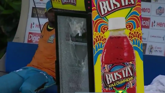 Dwayne Smith's shot went for six and shattered the glass of the refrigerator. Photo Courtesy: Ankit Mishra Twitter (Photo Grab)