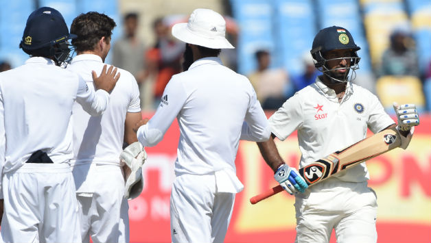 Cheteshwar Pujara survived the first review © AFP