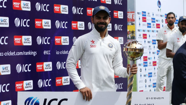 Virat Kohli received the mace after India's 2-1 series win over Australia at Dharamsala © IANS