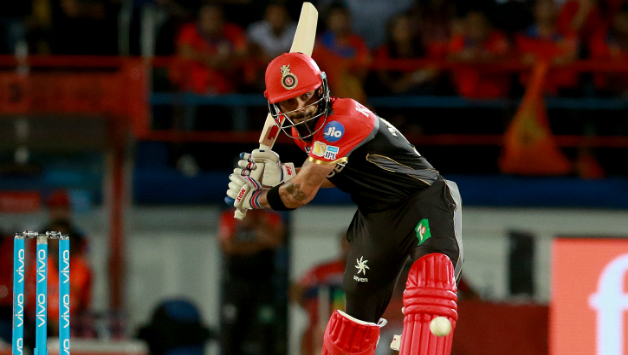 Virat Kohli scored his second fifty in this tournament and added crucial partnership with Chris Gayle © BCCI