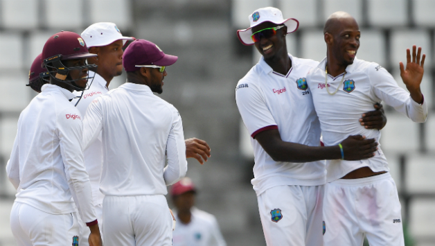 Roston Chase shone with the bat as well as ball, claiming the Man of the Match © AFP