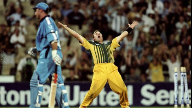 An exalted Shane Warne celebrates as a dejected Nasser Hussain walks back © Getty Images 