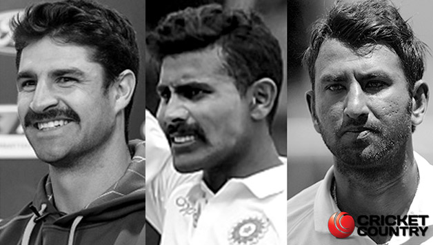 Colin de Grandhomme, Ravindra Jadeja, and Cheteshwar Pujara © AFP 