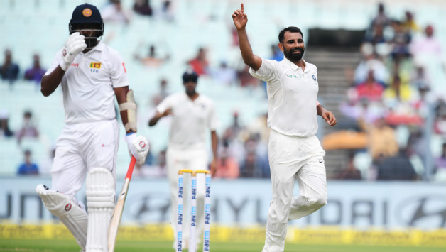 Dilruwan Perera looking at the dressing room © AFP