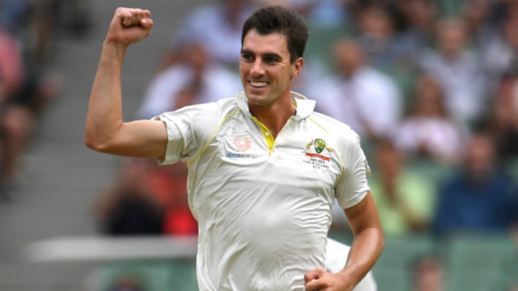 Cummins bowling for Australia during a Test match